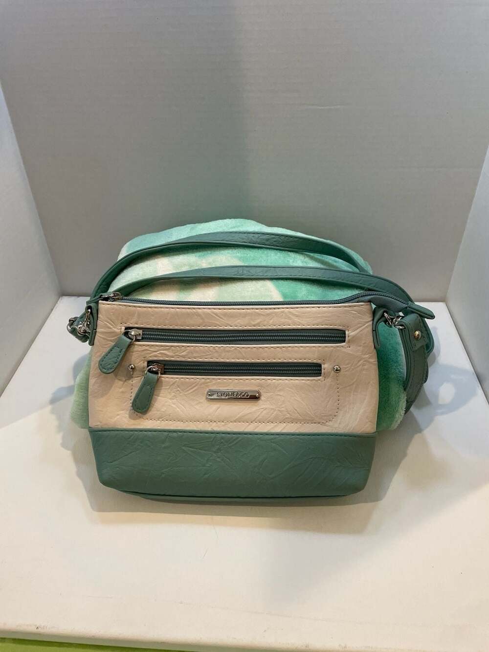 Stone & Co Talia Bonded Leather Crossbody Purse . Sage Green/Cream.